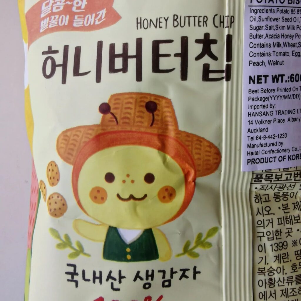 Calbee honey butter chips a friendly looking bee mascot  on the back of the packaging